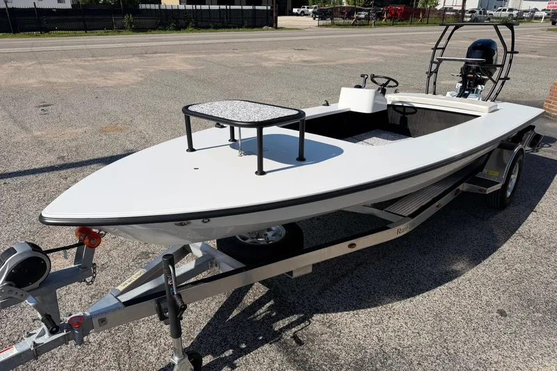 Slide: The Image of 2026 Chittum Skiffs 18 Challenger 2.0 Tunnel on trailer, parked outdoors. - 3