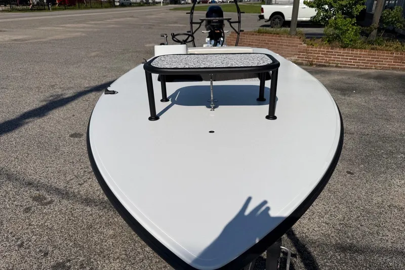 Slide: The Image of 2026 Chittum Skiffs 18 Challenger 2.0 Tunnel boat, parked on pavement, front view. - 6