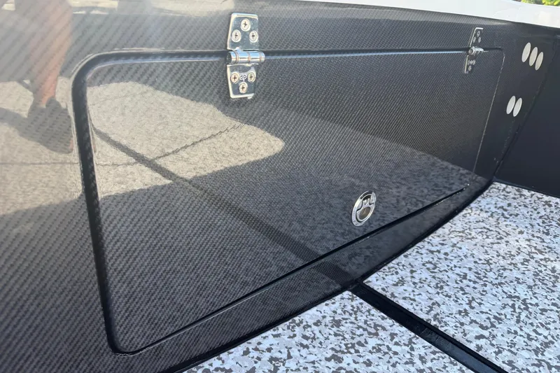 Slide: The Image of 2026 Chittum Skiffs 18 Challenger 2.0 Tunnel with carbon fiber detailing and secure hatch. - 9