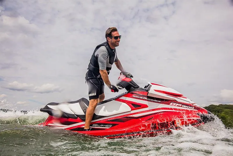 Slide: The Image of Man riding 2017 Yamaha GP 1800 jet ski on water. - 10