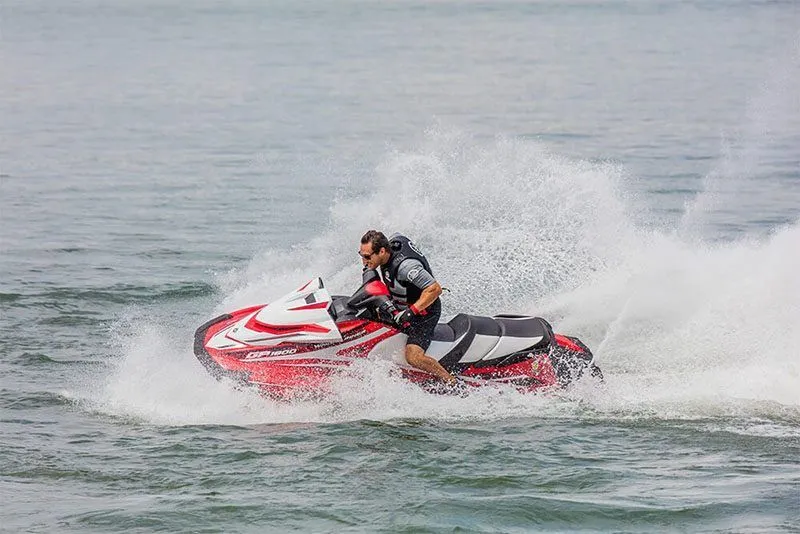 Slide: The Image of Man riding 2017 Yamaha GP 1800 jet ski on water. - 11