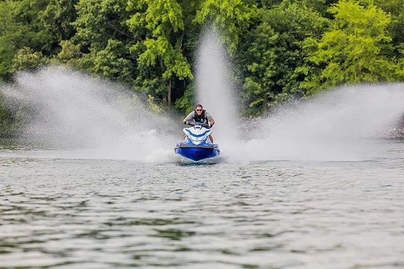 Slide: The Image of 2017 Yamaha GP 1800 jet ski on a lake with splashing water. - 13