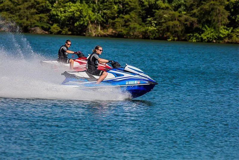 Slide: The Image of Two Yamaha GP 1800 jet skis from 2017 on a lake. - 14