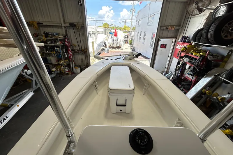 Slide: The Image of 2005 SeaCraft SC 23 Classic boat interior in a workshop setting. - 7