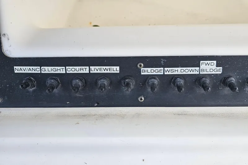 Slide: The Image of Control panel of a 1998 Bayliner 2503 Trophy Center Console boat. - 16