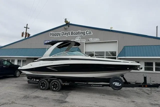 Slide: The Image of 2022 Crownline 265 SS boat on trailer at Happy Days Boating Co. dealership. - 1