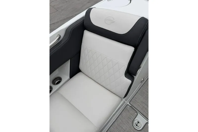 Slide: The Image of 2022 Crownline 265 SS boat seat with diamond-stitched upholstery and cup holders. - 11