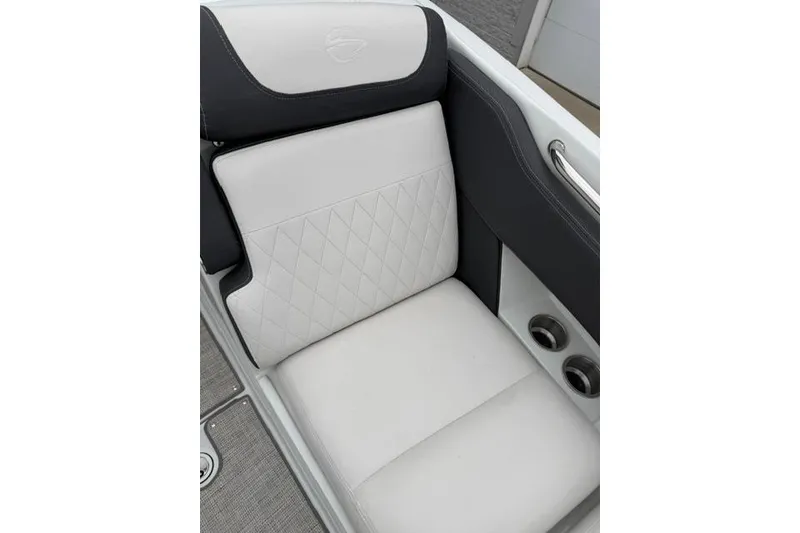 Slide: The Image of 2022 Crownline 265 SS boat seat with diamond-stitched upholstery and cup holders. - 12
