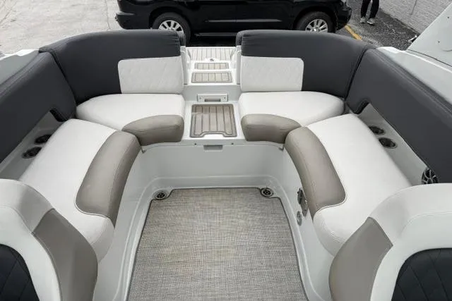 Slide: The Image of 2022 Crownline 265 SS boat interior with spacious seating and modern design. - 14