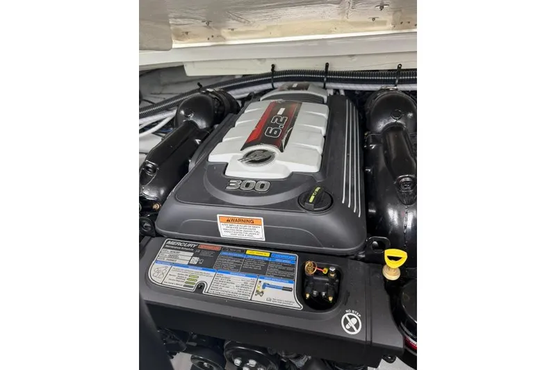 Slide: The Image of 2022 Crownline 265 SS boat engine, featuring a 6.2L Mercury 300 horsepower motor. - 16