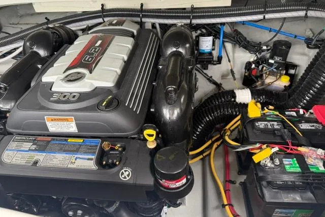 Slide: The Image of Engine compartment of a 2022 Crownline 265 SS boat, featuring a 6.2L engine. - 17