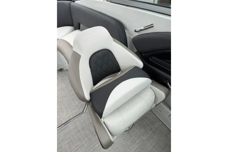 Slide: The Image of 2022 Crownline 265 SS boat seat with modern design and premium upholstery. - 8