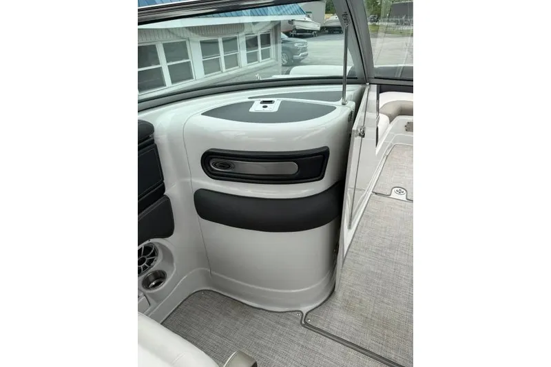 Slide: The Image of Interior view of 2022 Crownline 265 SS boat, featuring sleek design and modern finishes. - 9