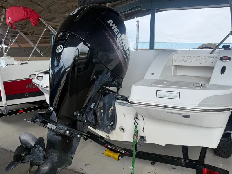 Slide: The Image of Starcraft 2000 IO Limited 2015 with Mercury outboard motor. - 11