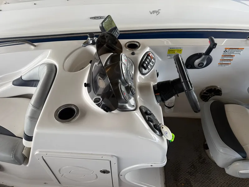 Slide: The Image of Cockpit of a 2015 Starcraft 2000 IO Limited boat. - 5