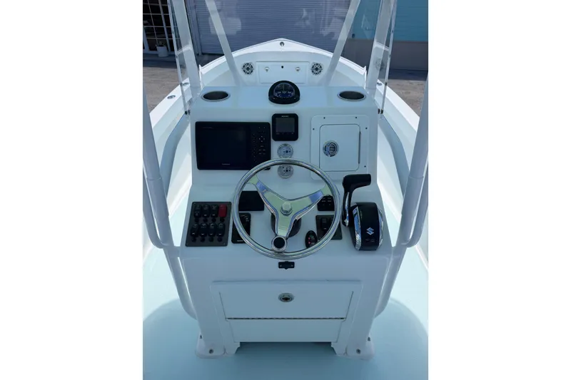 Slide: The Image of 2014 Albury Brothers 20 boat console with steering wheel and navigation controls. - 7