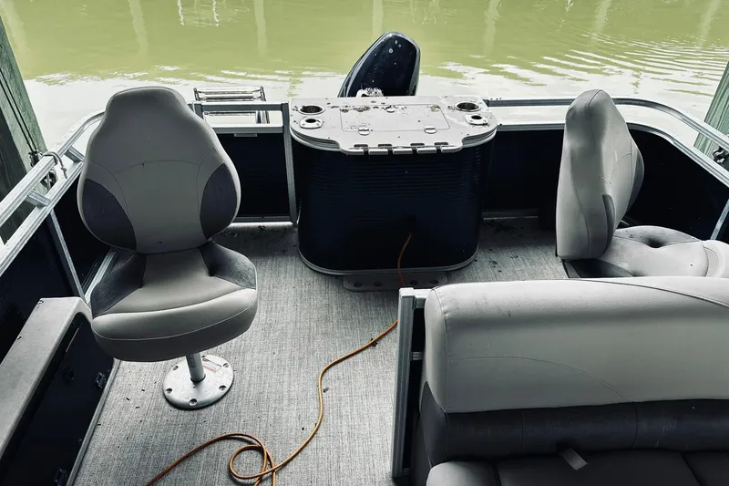 Slide: The Image of 2021 Avalon LSZ Rear Fish boat interior with seating and fishing station. - 11