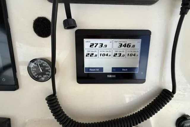 Slide: The Image of Dashboard of 2023 Grady-White Canyon 326 with Yamaha display and gauges. - 22