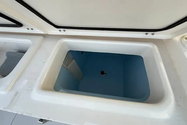 Slide: The Image of Livewell compartment on 2023 Grady-White Canyon 326 boat. - 27