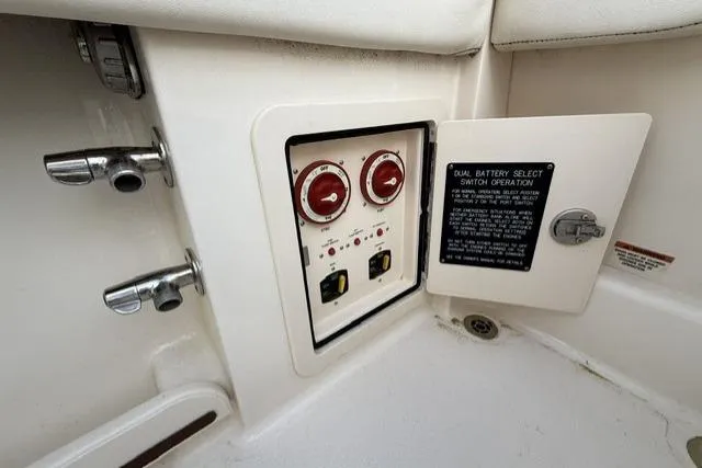 Slide: The Image of Dual battery switch panel on 2023 Grady-White Canyon 326 boat. - 32