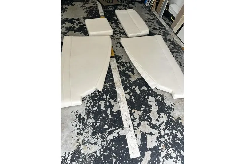 Slide: The Image of Cushion set for 2023 Grady-White Canyon 326 boat on a textured floor. - 57
