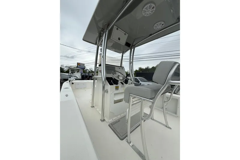 Slide: The Image of 2023 KenCraft 2460 Bayrider boat interior with steering console and seating. - 7