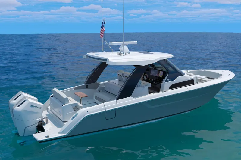 Slide: The Image of Manufacturer Provided Image: 2026 Tiara Yachts 35 LS on clear blue ocean, showcasing sleek design and modern features. - 1