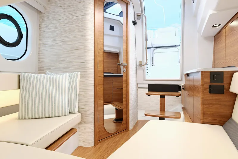Slide: The Image of Manufacturer Provided Image: Luxurious interior of 2026 Tiara Yachts 35 LS, featuring elegant wood finishes and modern design. - 4