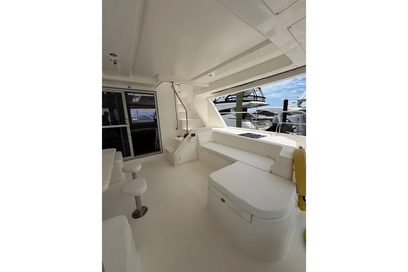 Slide: The Image of 2015 Leopard 51 Powercat yacht interior with seating and ocean view. - 12