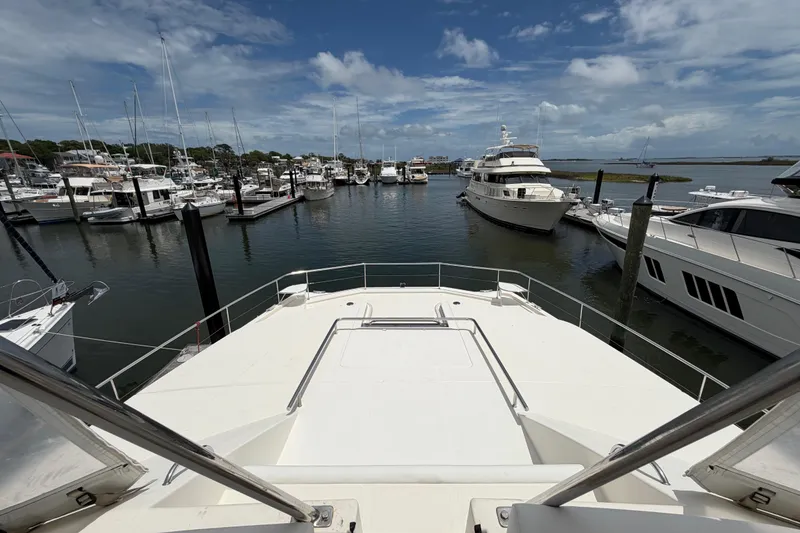 Slide: The Image of View from Leopard 51 Powercat 2015 yacht overlooking marina with multiple boats docked. - 15