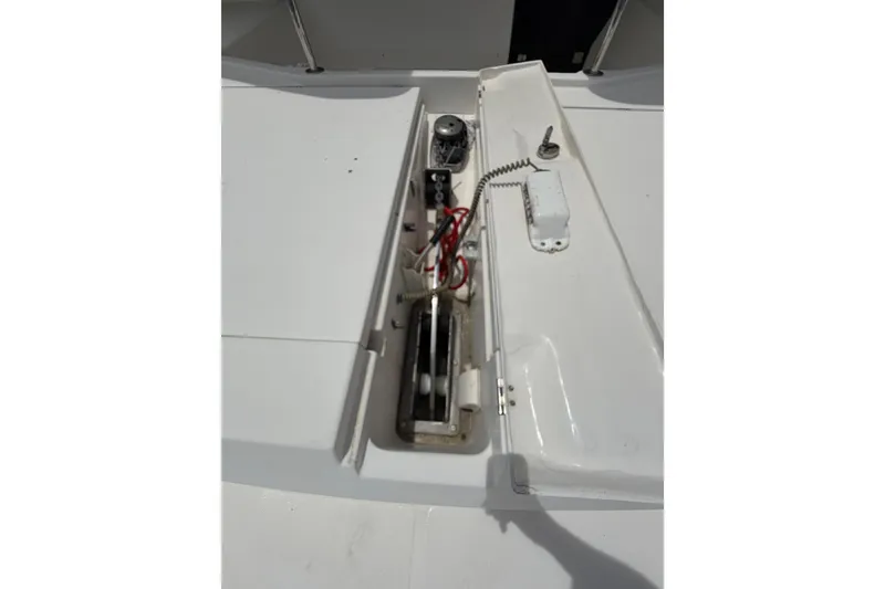 Slide: The Image of Open hatch on 2015 Leopard 51 Powercat, revealing internal wiring and components. - 18