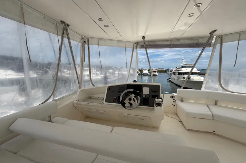 Slide: The Image of Interior view of 2015 Leopard 51 Powercat yacht with marina backdrop. - 31