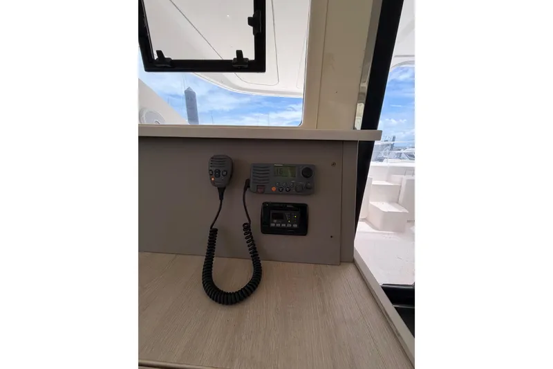 Slide: The Image of Interior view of 2015 Leopard 51 Powercat with communication equipment and ocean backdrop. - 37