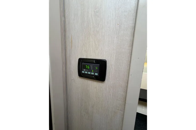 Slide: The Image of Thermostat on Leopard 51 Powercat 2015 yacht interior wall displaying temperature. - 41