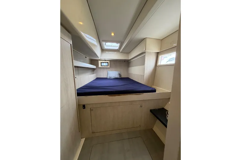 Slide: The Image of Cabin interior of 2015 Leopard 51 Powercat with bed and skylight. - 42
