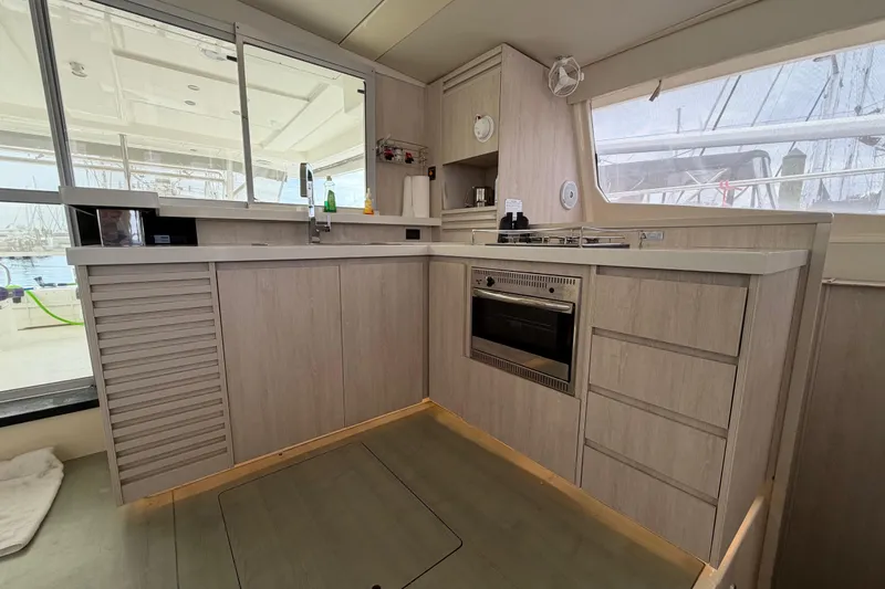 Slide: The Image of Modern kitchen interior of 2015 Leopard 51 Powercat yacht with sleek cabinetry and appliances. - 43