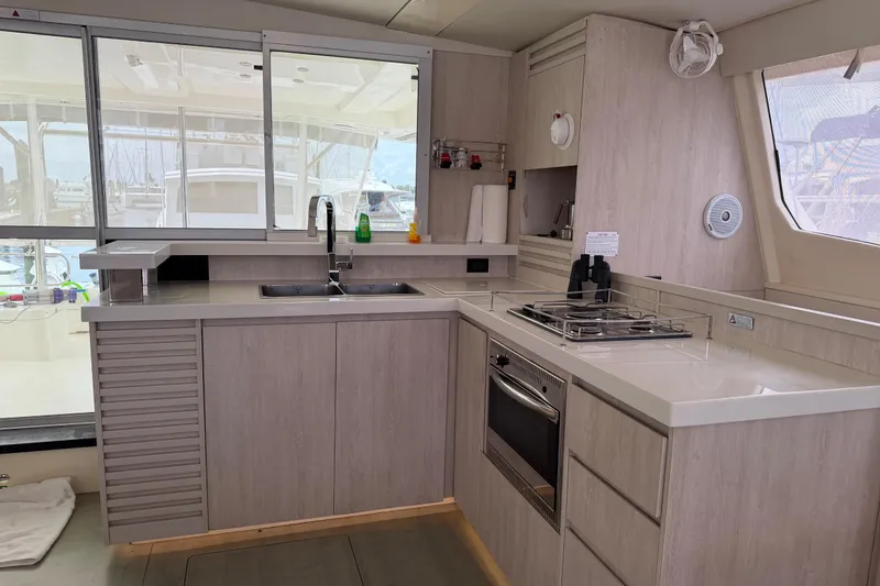 Slide: The Image of Modern kitchen interior of 2015 Leopard 51 Powercat yacht with sleek countertops and appliances. - 45