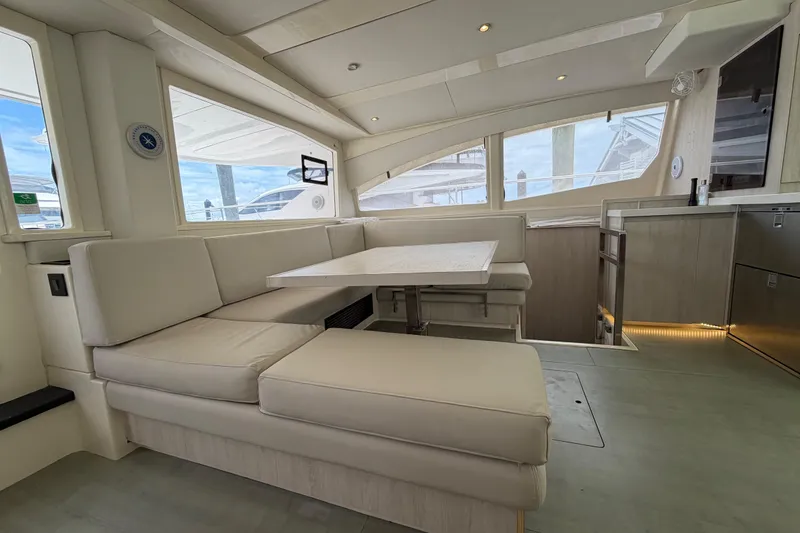 Slide: The Image of Luxurious interior of 2015 Leopard 51 Powercat yacht with modern seating and dining area. - 47