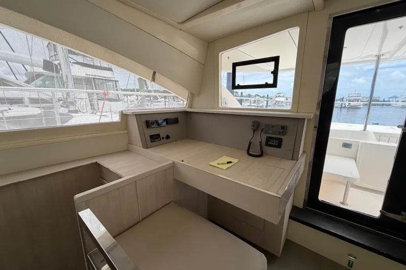 Slide: The Image of Interior view of a 2015 Leopard 51 Powercat yacht, featuring a navigation station. - 49