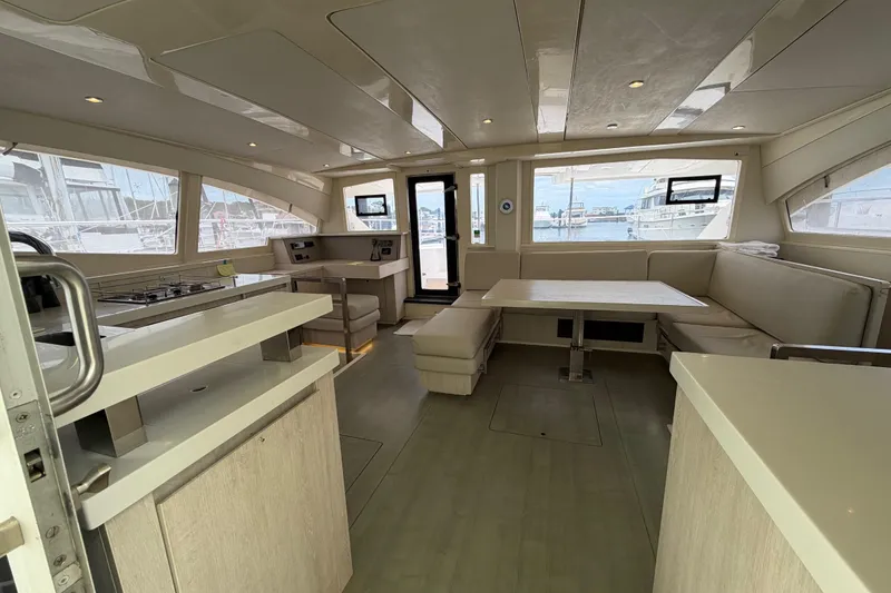 Slide: The Image of Interior of 2015 Leopard 51 Powercat yacht with modern kitchen and seating area. - 54