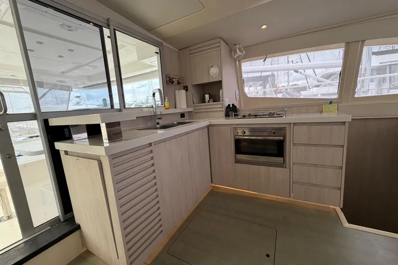 Slide: The Image of Modern kitchen interior of 2015 Leopard 51 Powercat yacht with sleek cabinetry and appliances. - 55