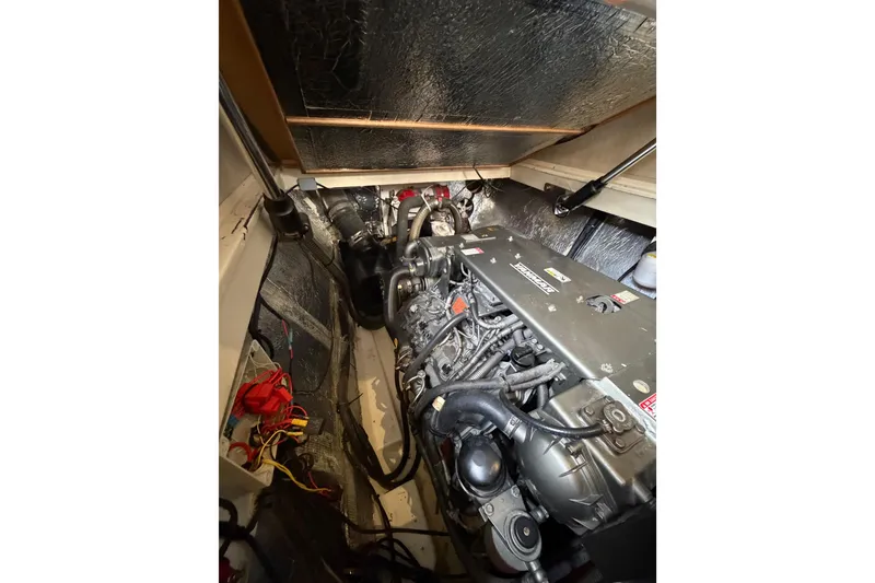 Slide: The Image of Engine room of 2015 Leopard 51 Powercat with visible machinery and wiring. - 58