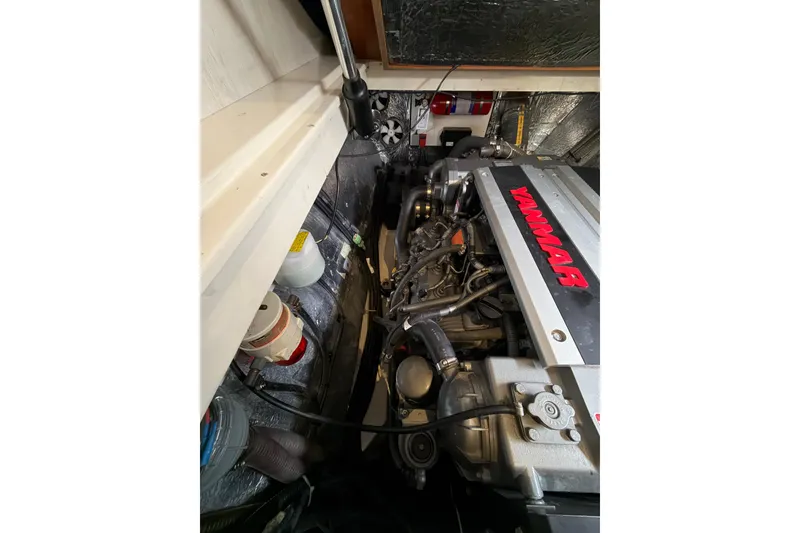 Slide: The Image of Engine room of 2015 Leopard 51 Powercat featuring Yanmar engine components. - 59
