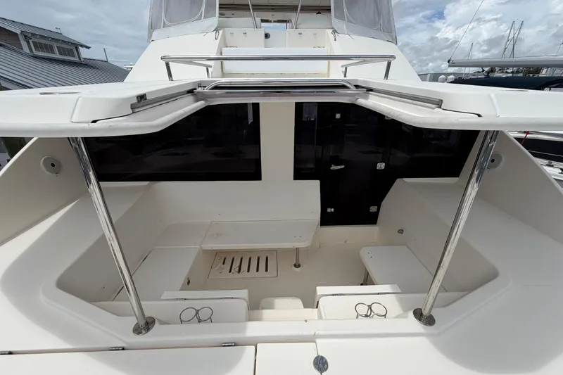 Slide: The Image of 2015 Leopard 51 Powercat cockpit with seating and stainless steel railings. - 6