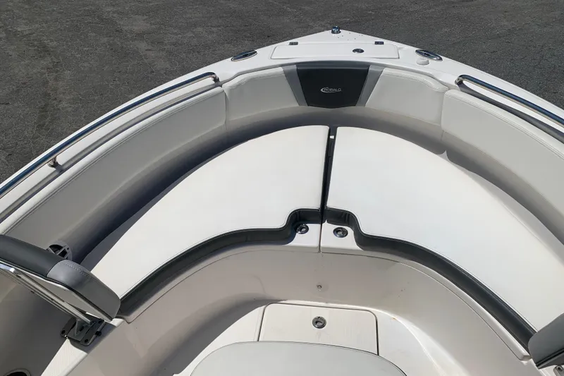 Slide: The Image of 2023 Robalo R222 Center Console boat interior with cushioned seating and sleek design. - 4