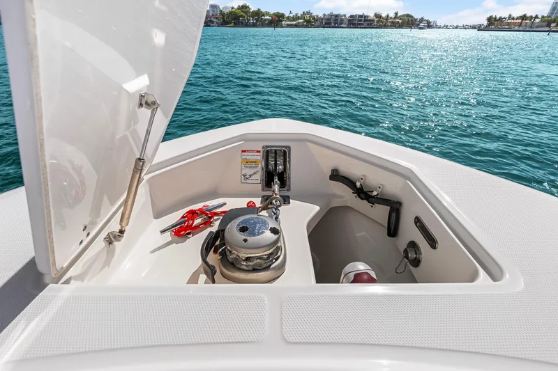 Slide: The Image of 2017 Boston Whaler 330 Outrage anchor compartment with ocean view. - 33
