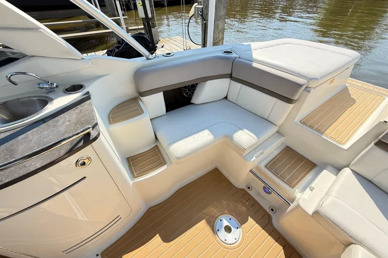 Slide: The Image of Interior of a 2011 Sea Ray 270 SLX boat with seating and sink. - 44