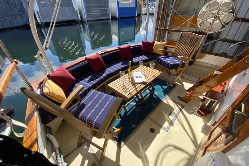 Slide: The Image of Elegant 1939 Elco Motor Yacht deck with stylish seating and nautical decor. - 3