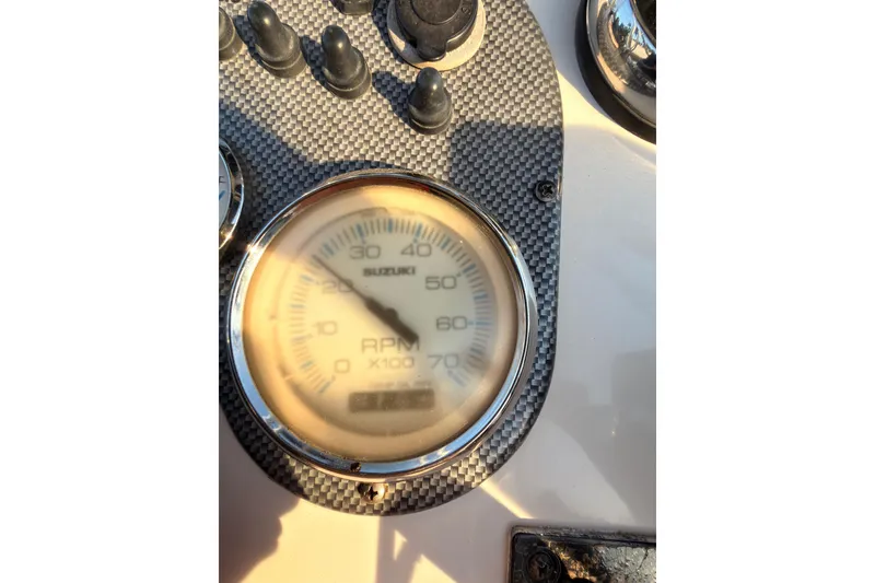 Slide: The Image of Close-up of a Suzuki RPM gauge on a 2013 Carolina Skiff 198 DLV boat. - 20