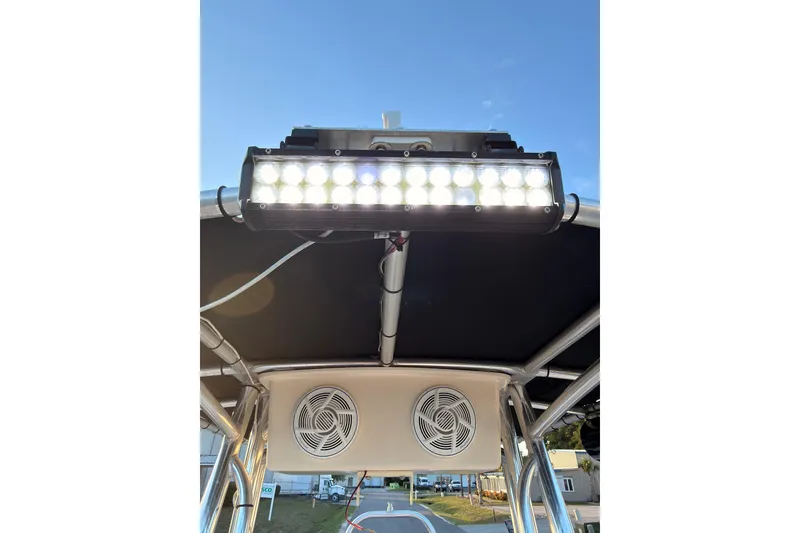 Slide: The Image of LED light bar and speakers on 2013 Carolina Skiff 198 DLV boat. - 23